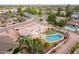 Aerial view of backyard featuring a pool, patio, and grass at 2148 E Cairo Dr, Tempe, AZ 85282