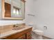 Bathroom with vanity, sink, medicine cabinet and toilet at 2148 E Cairo Dr, Tempe, AZ 85282