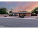 Well-maintained single-story home with a tidy yard, complemented by mature trees and a quaint design at 2148 E Cairo Dr, Tempe, AZ 85282