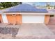 This home features a two car garage with solar panels above at 2148 E Cairo Dr, Tempe, AZ 85282