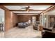 The comfortable living room features wood-paneled walls and tile floors at 2148 E Cairo Dr, Tempe, AZ 85282