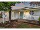 Charming home featuring a quaint front entrance with a colorful door and decorative window detail at 222 N Miller St, Mesa, AZ 85203