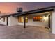 Exterior view of the back of the house and covered back patio at 226 W Ranch Rd, Tempe, AZ 85284