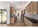 Modern kitchen showcasing stainless appliances, wood cabinets, and an open design at 226 W Ranch Rd, Tempe, AZ 85284