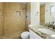 Modern bathroom featuring tile floors, tiled walls, a granite-topped vanity, and a tiled walk-in shower at 23 W Fairmont Dr, Tempe, AZ 85282