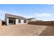 A large graded backyard is ready for your personal touch at 23403 W Albeniz Pl, Buckeye, AZ 85326