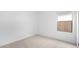 Neutral bedroom with carpet, window, and natural light at 23403 W Albeniz Pl, Buckeye, AZ 85326