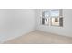 Bedroom with carpet, windows, and natural light at 23403 W Albeniz Pl, Buckeye, AZ 85326