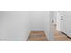 Hallway with light wood floors and white trim at 23403 W Albeniz Pl, Buckeye, AZ 85326
