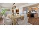 Dining room with modern lighting and seamless access to the kitchen at 2436 E Elm St, Phoenix, AZ 85016