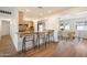 Open concept kitchen with breakfast bar and stainless steel appliances at 2436 E Elm St, Phoenix, AZ 85016