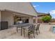 Back patio with a comfortable seating area and a view to interior at 2926 E Minnezona Ave, Phoenix, AZ 85016