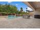A relaxing backyard features a private pool, lush landscaping, and patio seating at 2926 E Minnezona Ave, Phoenix, AZ 85016