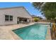 Enjoy the backyard pool with a waterfall and low-maintenance landscaping at 2926 E Minnezona Ave, Phoenix, AZ 85016