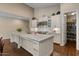 Spacious kitchen with granite countertops, a large island, and modern stainless steel appliances at 2926 E Minnezona Ave, Phoenix, AZ 85016