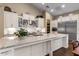 Gourmet kitchen features an oversized island, granite countertops, and stainless steel appliances at 2926 E Minnezona Ave, Phoenix, AZ 85016