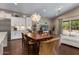 Open-concept kitchen flows into the dining and living areas, offering seamless access to the outdoor pool at 2926 E Minnezona Ave, Phoenix, AZ 85016