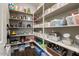 Well-organized pantry with ample shelving, providing plenty of storage space for food and kitchen essentials at 2926 E Minnezona Ave, Phoenix, AZ 85016