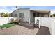 Exterior view of home featuring backyard with patio, gravel, and fenced yard at 3104 E Broadway Rd # 170, Mesa, AZ 85204