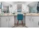 Bathroom featuring an airy vanity with double mirrors and lots of light at 3104 E Broadway Rd # 170, Mesa, AZ 85204