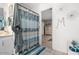 Well-appointed bathroom with decorative shower curtain, vanity and tile flooring at 3104 E Broadway Rd # 170, Mesa, AZ 85204