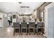 Open concept kitchen with bar stool seating, complemented by stainless steel appliances and modern finishes at 3104 E Broadway Rd # 170, Mesa, AZ 85204