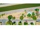Aerial view of residence featuring desert landscaping, mature trees, near a canal with street access at 330 W Minnezona Ave, Phoenix, AZ 85013