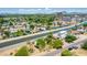An aerial view of the winding canal surrounded by a thriving residential neighborhood at 330 W Minnezona Ave, Phoenix, AZ 85013