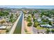 High-angle of homes alongside the canal, highlighting a well-maintained community and the canal at 330 W Minnezona Ave, Phoenix, AZ 85013