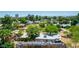 Aerial view of the residence with a view of the city skyline in the distance at 330 W Minnezona Ave, Phoenix, AZ 85013