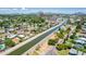 Lovely view of homes neighboring a canal, displaying lush landscaping and a desirable community setting at 330 W Minnezona Ave, Phoenix, AZ 85013