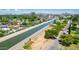 The winding canal is seen from above, surrounded by a vibrant neighborhood at 330 W Minnezona Ave, Phoenix, AZ 85013