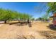 Open backyard space featuring mature trees around the perimeter of the property at 330 W Minnezona Ave, Phoenix, AZ 85013