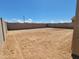 Spacious backyard with block fence at 35459 N Seedling St, San Tan Valley, AZ 85144