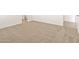 Neutral colored carpet throughout this bright bedroom at 35459 N Seedling St, San Tan Valley, AZ 85144