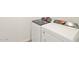 Laundry area equipped with modern washer and dryer units at 35459 N Seedling St, San Tan Valley, AZ 85144