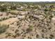 Overhead view showing the layout of a horse property with arena, stalls, and adjacent to a residential area at 39606 N 3Rd Ave, Phoenix, AZ 85086