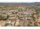 An aerial view shows a desert landscape with scattered homes on large lots, showcasing a peaceful residential area at 39606 N 3Rd Ave, Phoenix, AZ 85086