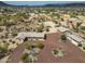Aerial view of the home and landscaping, including horse corral and multiple outbuildings at 39606 N 3Rd Ave, Phoenix, AZ 85086