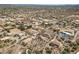 This aerial shows a quiet desert neighborhood with custom houses that have large lots and mature vegetation around the properties at 39606 N 3Rd Ave, Phoenix, AZ 85086