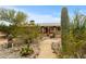 Backyard featuring desert landscaping, stone pathway and covered patio at 39606 N 3Rd Ave, Phoenix, AZ 85086