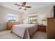 Bedroom with neutral tones, ceiling fan, carpet, and desert view window at 39606 N 3Rd Ave, Phoenix, AZ 85086