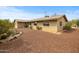 Exterior view of brick home with desert landscaping and rock features at 39606 N 3Rd Ave, Phoenix, AZ 85086