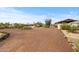 Wide view of the home's brick exterior with desert landscaping at 39606 N 3Rd Ave, Phoenix, AZ 85086