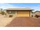 This property features a detached garage with a large gravel driveway and convenient bench at 39606 N 3Rd Ave, Phoenix, AZ 85086