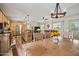 Inviting living space boasts an open layout connecting kitchen, dining, and living areas with backyard views at 39606 N 3Rd Ave, Phoenix, AZ 85086