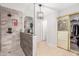 Contemporary bathroom featuring a glass enclosed shower and a mirrored closet at 412 W Curry St, Chandler, AZ 85225
