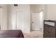Spare bedroom featuring wall closet, carpet, and natural light at 412 W Curry St, Chandler, AZ 85225