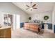 Spacious bedroom with vaulted ceilings, a sliding glass door, and a cozy, inviting bed at 412 W Curry St, Chandler, AZ 85225