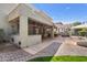 Spacious backyard with a covered patio, outdoor kitchen, and beautifully landscaped areas, creating an ideal outdoor retreat at 4340 S Marble St, Gilbert, AZ 85297